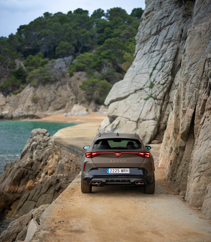 CUPRA%20Formentor%20petrol%20blue%20matte%20with%20rear%20coast%20to%20coast%20taillights