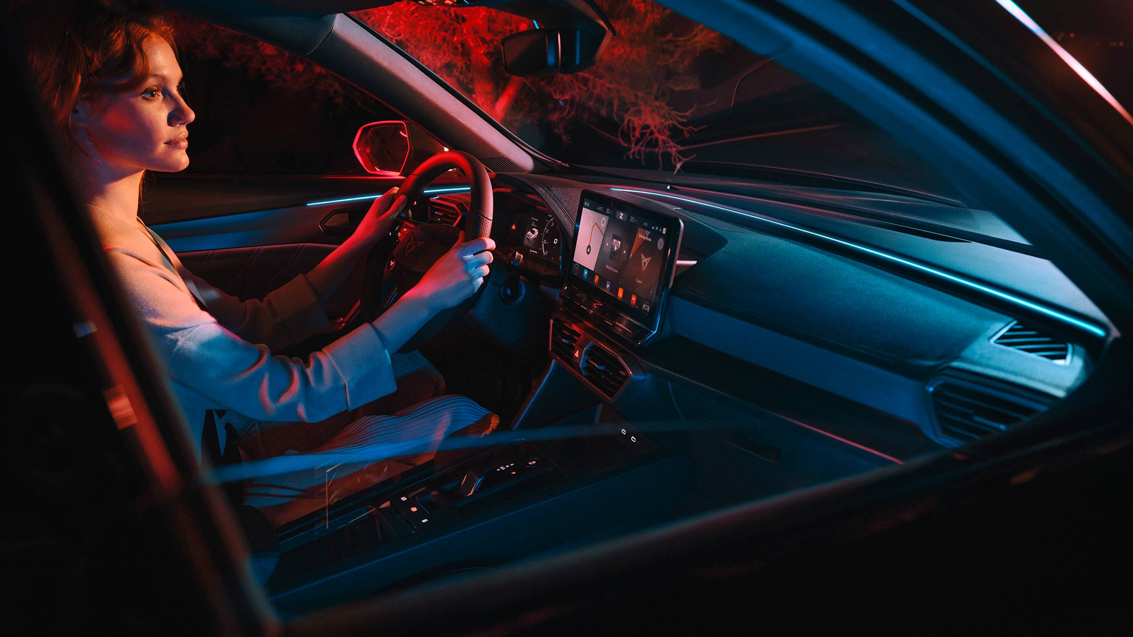 woman inside the new cupra formentor with led lighting 