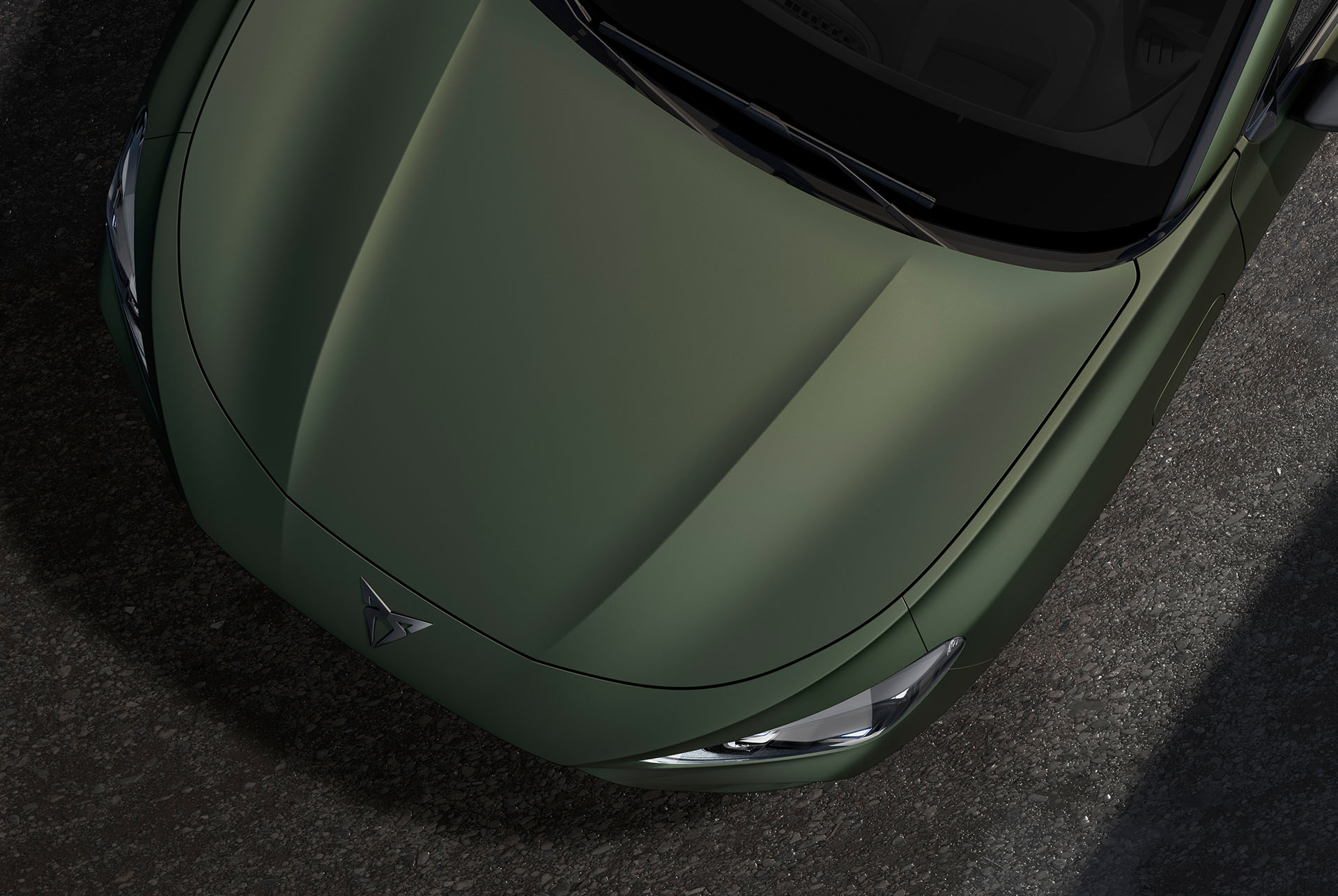 Upper shot of the CUPRA Terramar’s front in manganese matt.