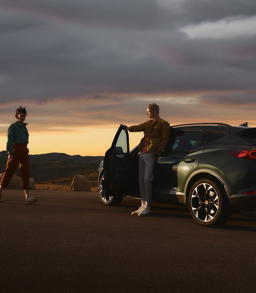 couple-standing-in-front-of-cupra-formentor