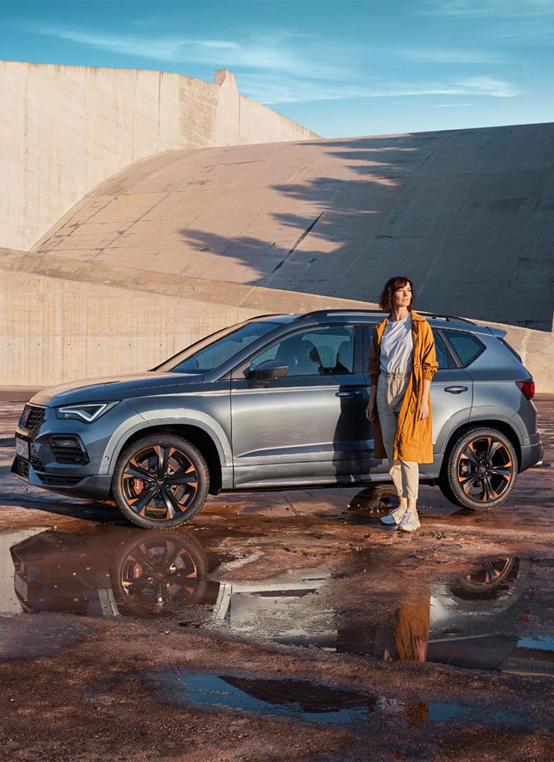  Woman standing next to a CUPRA Formentor 2020